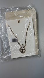 Zara МЕТАЛЛИЧЕСКОЕ ОЖЕРЕЛЬЕ С ЦВЕТАМИ И БУТЫЛКОЙ Aged gold | 1011/261/970