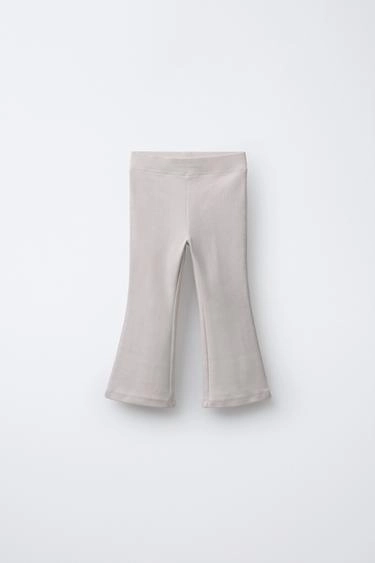 FLARE PLUSH TROUSERS WITH RAISED SLOGAN- Заказать в России