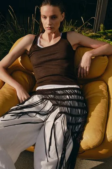 Кожаный ремень крючком с кисточками- Заказать в России