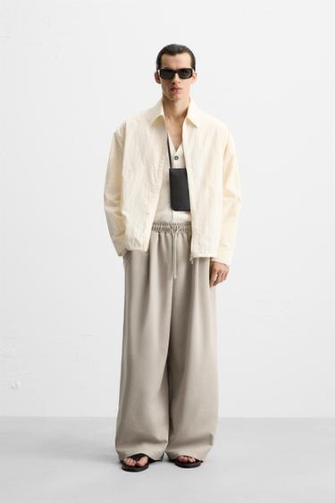 ДЖОГГЕРЫ WIDE-LEG ИЗ ВЫСОКОТЕХНОЛОГИЧНОЙ ТКАНИ