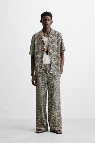 ЖАККАРДОВЫЕ БРЮКИ RELAXED FIT С ПЕРФОРАЦИЕЙ