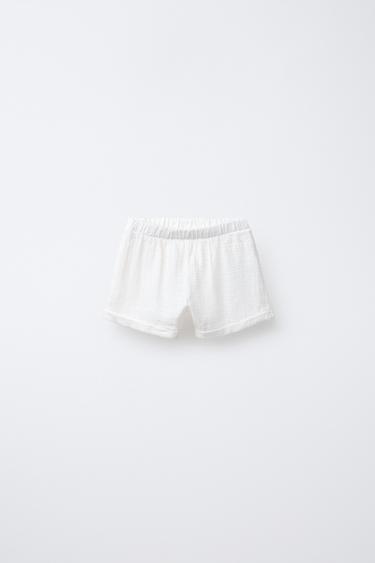 Zara Однотонные контрастные шорты купить с доставкой.