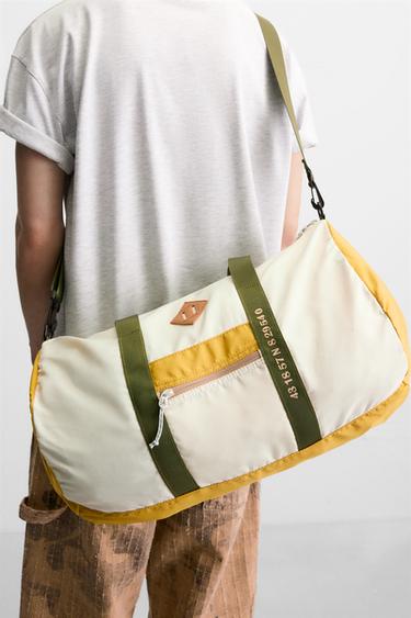 CONTRAST TRAVEL BAG