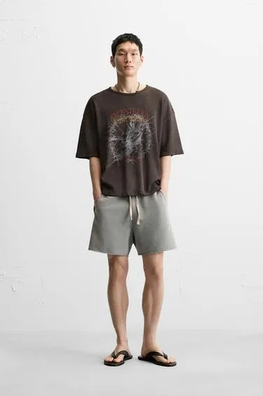 Шорты RELAXED FIT из ткани с эффектом потертости