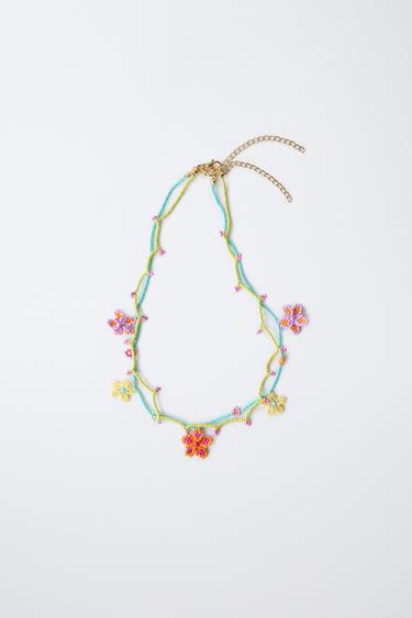 PACK OF TWO NECKLACES WITH FLOWER BEADS