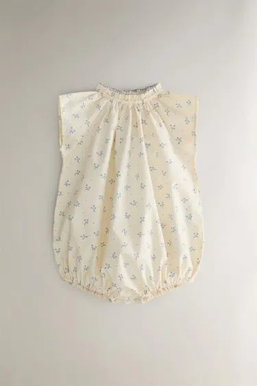 CHILDREN'S FLORAL ROMPER