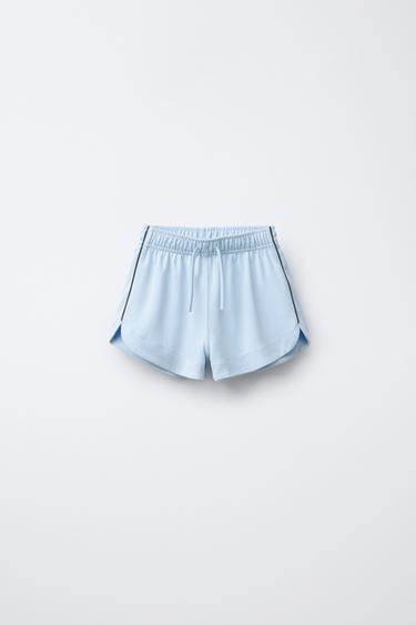 Zara Бермуды с отделкой