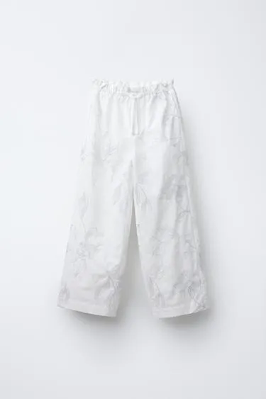 SHINY EMBROIDERED TROUSERS