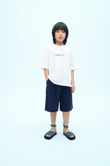 Zara Однотонная футболка с надписью X FANGLU LIN купить с доставкой.