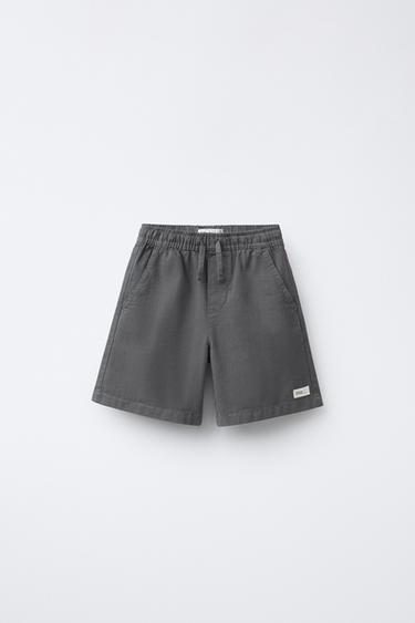 Zara Хлопковые шорты-бермуды широкого кроя с этикеткой купить с доставкой.