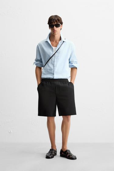 Zara Шорты-бермуды классического кроя из тканевой структуры купить с доставкой.