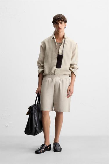 Zara Шорты-бермуды классического кроя из тканевой структуры купить с доставкой.