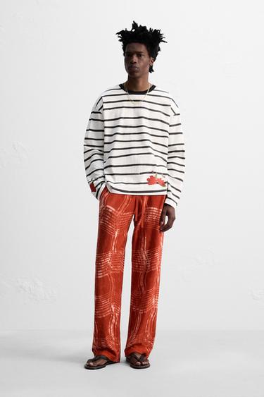Zara Трикотажные брюки с графическим принтом © OTIS KWAME KYE QUAICOE купить с доставкой.