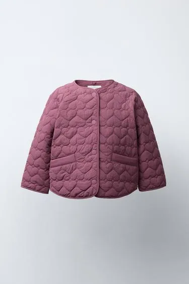 Стеганая куртка с этикеткой WATER REPELLENT