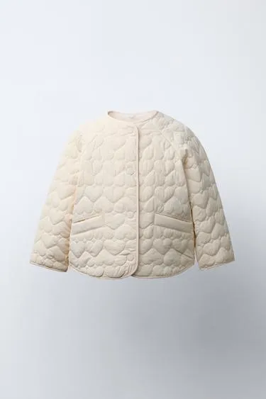 Стеганая куртка с этикеткой WATER REPELLENT