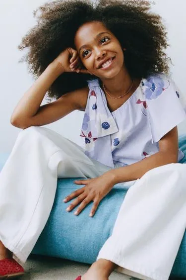 Асимметричный топ с цветочным принтом- Заказать в России