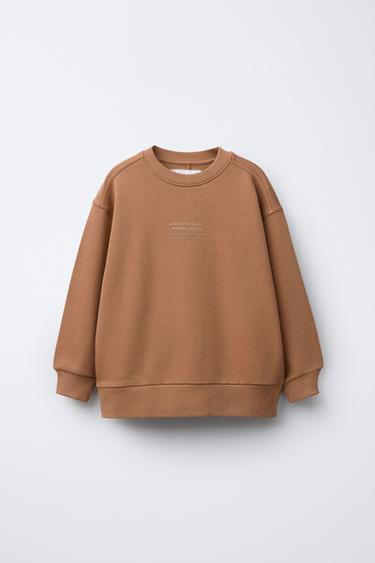 Zara Однотонная толстовка с рельефной надписью купить с доставкой.