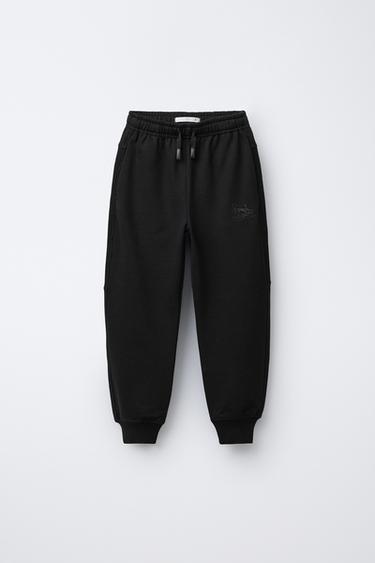 Zara Комбинированные брюки-джоггеры из вафельной ткани купить с доставкой.