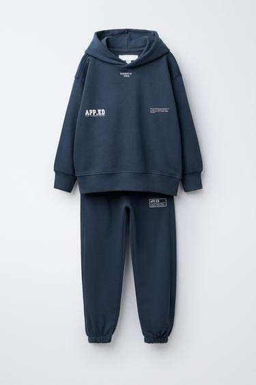 Zara Комплект из толстовки с капюшоном и брюк-джоггеров с текстом купить с доставкой.