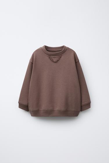 Zara Свитшот с деталями вязаного плетения купить с доставкой.
