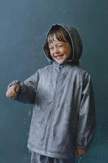 Прорезиненный дождевик с принтом WATER RESISTANT