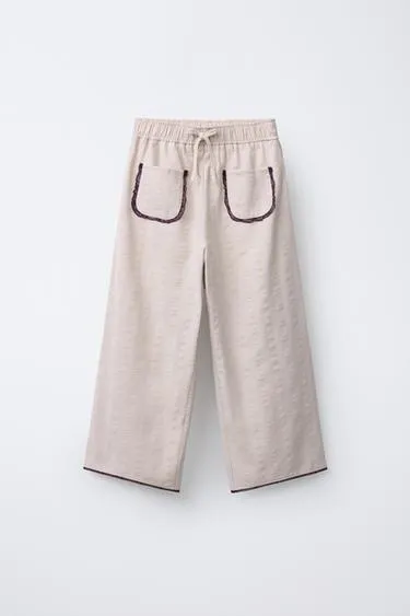 Прямые брюки с цветочным принтом и кружевной отделкой- Заказать в России