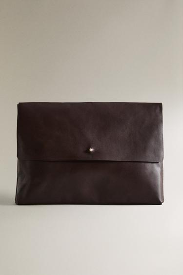 Zara Кожанный клатч-кейс купить с доставкой.