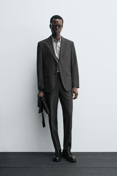 Zara Костюмные брюки в клетку купить с доставкой.