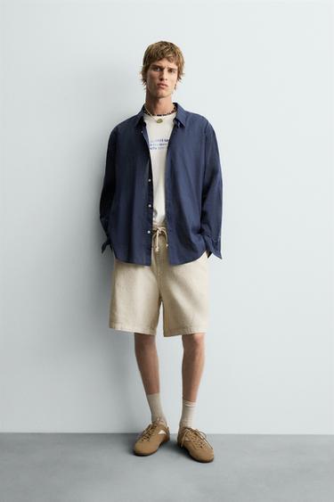 Zara Шорты с эффектом потертости RELAXED FIT купить с доставкой.