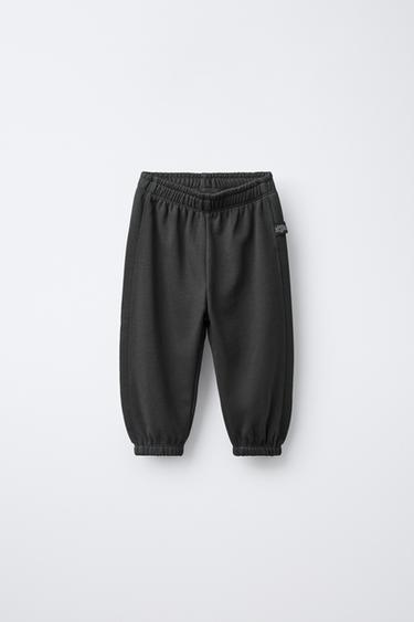 Zara Комплект из двух джоггеров из мягкой ткани с нашивкой купить с доставкой.