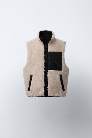 Zara Двусторонний жилет из искусственной овчины купить с доставкой.