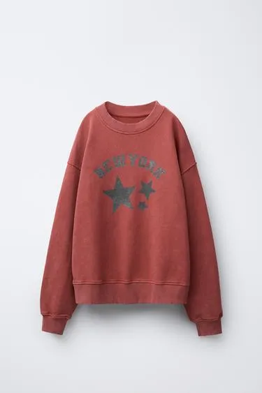 WASHED EFFECT SWEATSHIRT WITH SHINY STARS