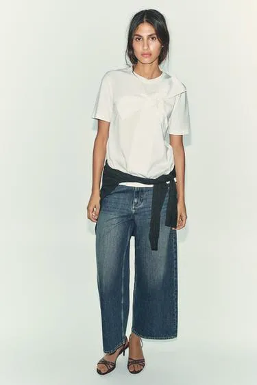 Футболка с бантом спереди