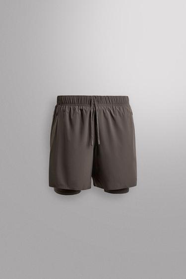 Zara Спортивные шорты 2-в-1 купить с доставкой.