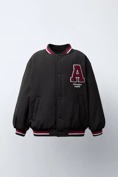 Бомбер с подкладкой из искусственной овчины с нашивкой- Заказать в России