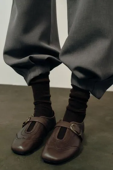 Кожаные балетки с перфорацией