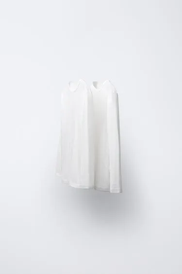 2-6 лет/набор из двух футболок с ажурной вязкой