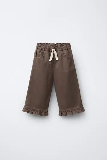 Брюки бэгги с воланами- Заказать в России