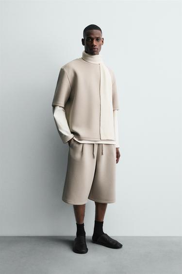 Zara Свитшот с эффектом неопрена и заклепкой