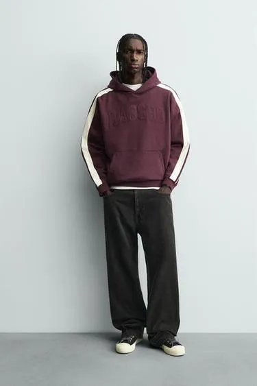 Толстовка с нашивками и контрастными полосами- Заказать в России