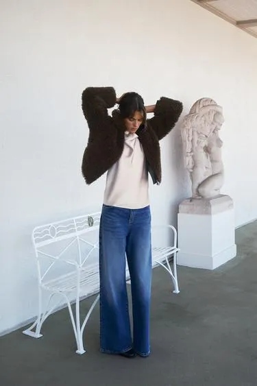 Длинная куртка из овчины