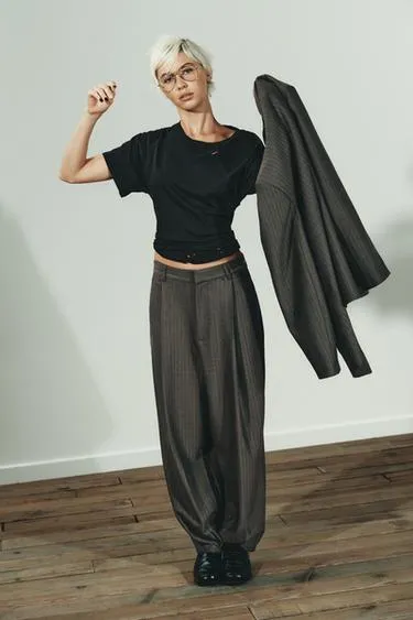 Брюки с защипами