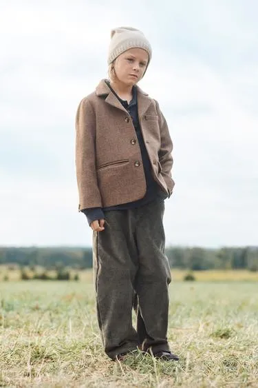 Эксклюзивный пиджак из рыбьего кости с шерстью и налокотниками- Заказать в России