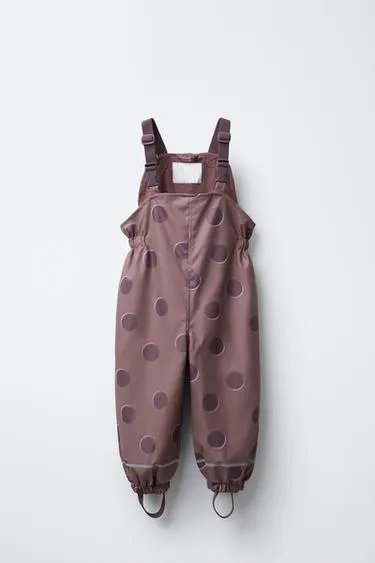 Прорезиненный комбинезон в горошек WATER RESISTANT
