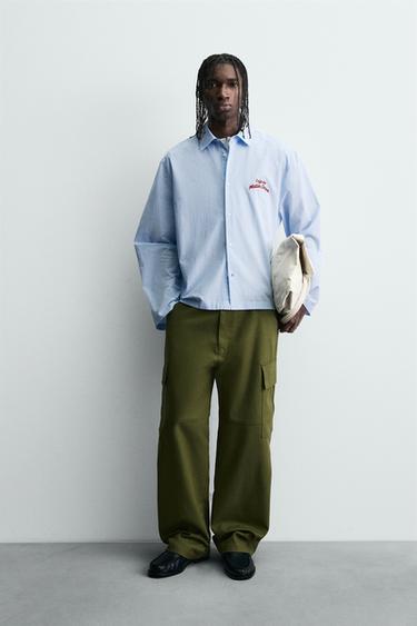 Zara Рубашка в полоску с графическим принтом