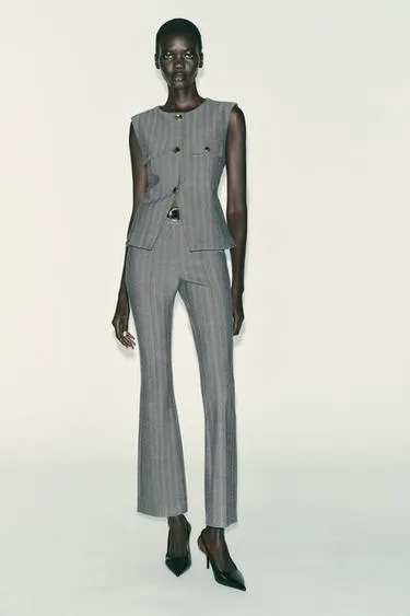 Жилет «ёлочка» расклешённого кроя