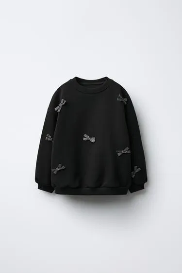 Толстовка с бантами и блестками