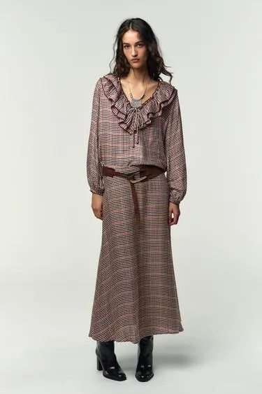 Блуза в клетку с воланами