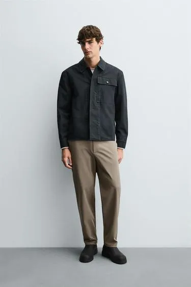 Брюки из рельефной ткани комфортного кроя- Заказать в России