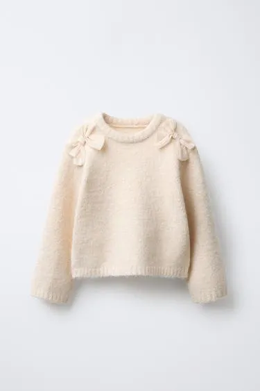 Свитер с атласными бантами- Заказать в России